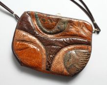 A SNAKESKIN AND LEATHER DESIGNER BAG 10 ins long