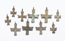 TEN SMALL ROMAN CAST IRON CRUCIFIXES