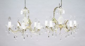 A SMALL PAIR OF ITALIAN GLASS FIVE LIGHT CHANDELIERS with prism drops. 1 ft. 6 ins. wide, 1ft high.