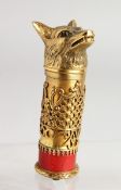 A SUPERB RUSSIAN SILVER GILT AND ENAMEL DOG'S HEAD WALKING STICK HANDLE. 3.5 ins