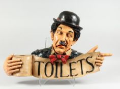 AN AMUSING CHARLIE CHAPLIN TOILET SIGN, 2 ft. 3 in. high.