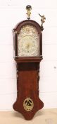 A DUTCH OAK CASED FRIESLAND WALL CLOCK, with embossed metal dial. 4 ft. 2ins high