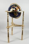 A HARDSTONE TERRESTRIAL GLOBE OF THE WORLD on a metal base. (AF)