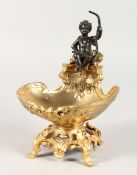 A GILT BRONZE CUPID SALT on a shell and acanthus base. 7 ins high.