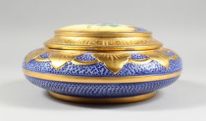 AN ITALIAN BLUE AND GILDED CIRCULAR BOWL AND COVER painted with roses, 9 in. diameter.