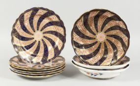 A SET OF SIX WORCESTER SWIRL PATTERN BLUE AND GILT PLATES. 9 ins diameter and three deep dishes 9