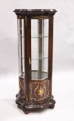 AN INLAID STANDING DISPLAY CABINET, octofoil form with 3/4 glass panels, 4 ft. 9 in. high, 1 ft. 1