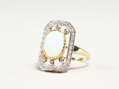 A SILVER GOLD PLATED OPAL RING