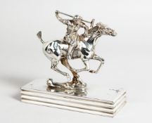 A POLO TROPHY, A PLATED HORSE AND RIDER (car mascot) on an octagonal base, 6 ins long.