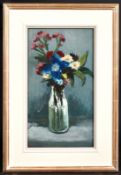 H. E. Lewis, A still life of mixed flowers in a glass vase, oil on board, signed with initials, 9