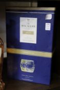 The Macallan Gold limited edition whisky box set with two glasses.