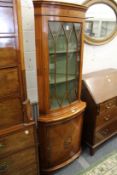 A good reproduction satinwood standing corner display cabinet.