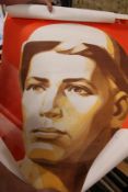 A small group of unframed Russian posters.