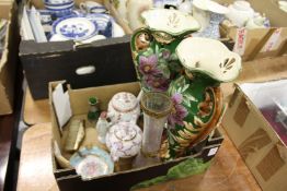 A pair of decorative vases and other items.