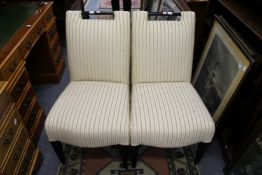 A pair of upholstered chairs.