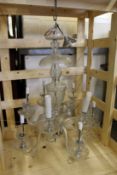 A large cut glass chandelier.