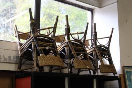 A set of six bamboo chairs.