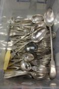 A large quantity of plated flatware to include forks and spoons.