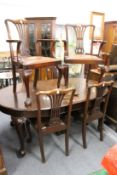 A set of six George III style mahogany dining chairs, two with arms.