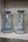 A pair of pale blue Jasperware candlesticks.