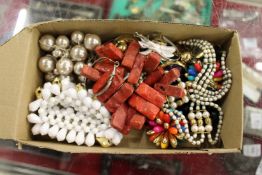A box of costume jewellery.
