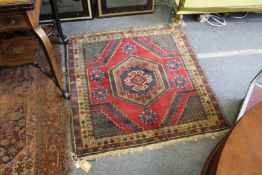A small Persian rug.
