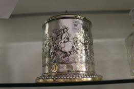 A good plated biscuit barrel decorated with knights on horseback etc.