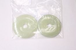 Two Chinese jade circular roundels.