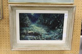A landscape with pond and trees, oil on canvas, signed M. Bouvier.