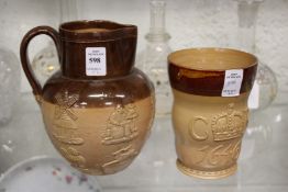 A Doulton salt glazed Royal Commemorative beaker or vase, together with a similar jug.
