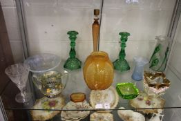 A Lalique moulded orange glass vase and other colourful glassware.