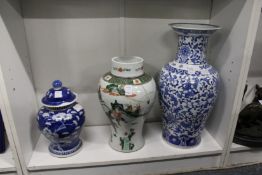 Two Chinese vases and a ginger jar and cover (AF).