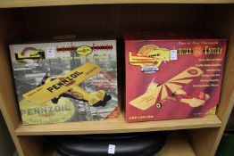 Two cast metal models of aeroplanes, boxed.