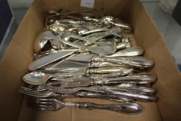 Various plated wares to include dessert knives and forks, soup ladles, sugar tongs etc.