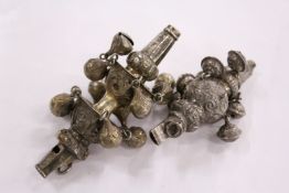 Two silver rattles, lacking teethers.