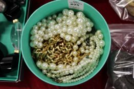 Pearl necklaces etc.