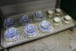 A group of Royal Worcester blue and white dragon decorated cups, saucers and plates, together with