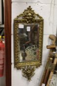 A good decorative cast brass framed wall mirror.