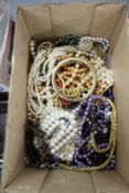 Various necklaces and other costume jewellery.