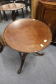 A 19th century mahogany tilt top tripod table.