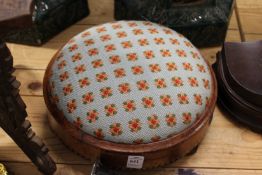 A Victorian walnut small circular stool.
