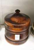 A lignum vitae tobacco jar and cover.