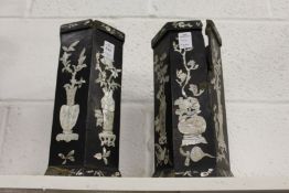 A pair of Chinese lacquer vases.