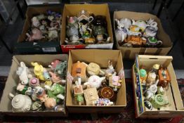 A large collection of novelty teapots.