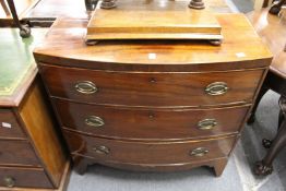 A 19th century mahogany bow fronted three drawer chest.
