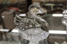 A swan shaped cut glass salt with plated mounts.