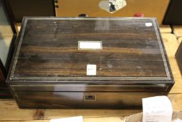 A Victorian coromandel writing slope.