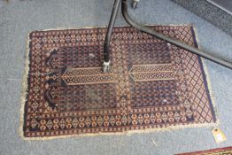 A small Persian rug.