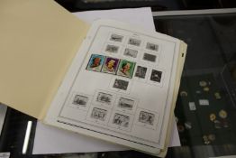 A quantity of stamps on loose sheets.