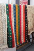 A colourful flat weave Kilim style carpet.